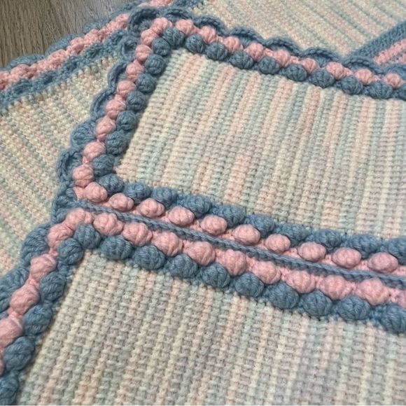 Hand Knitted Baby Blanket Blue and pink scalloped hem and pom pom edges. - Picture 5 of 6